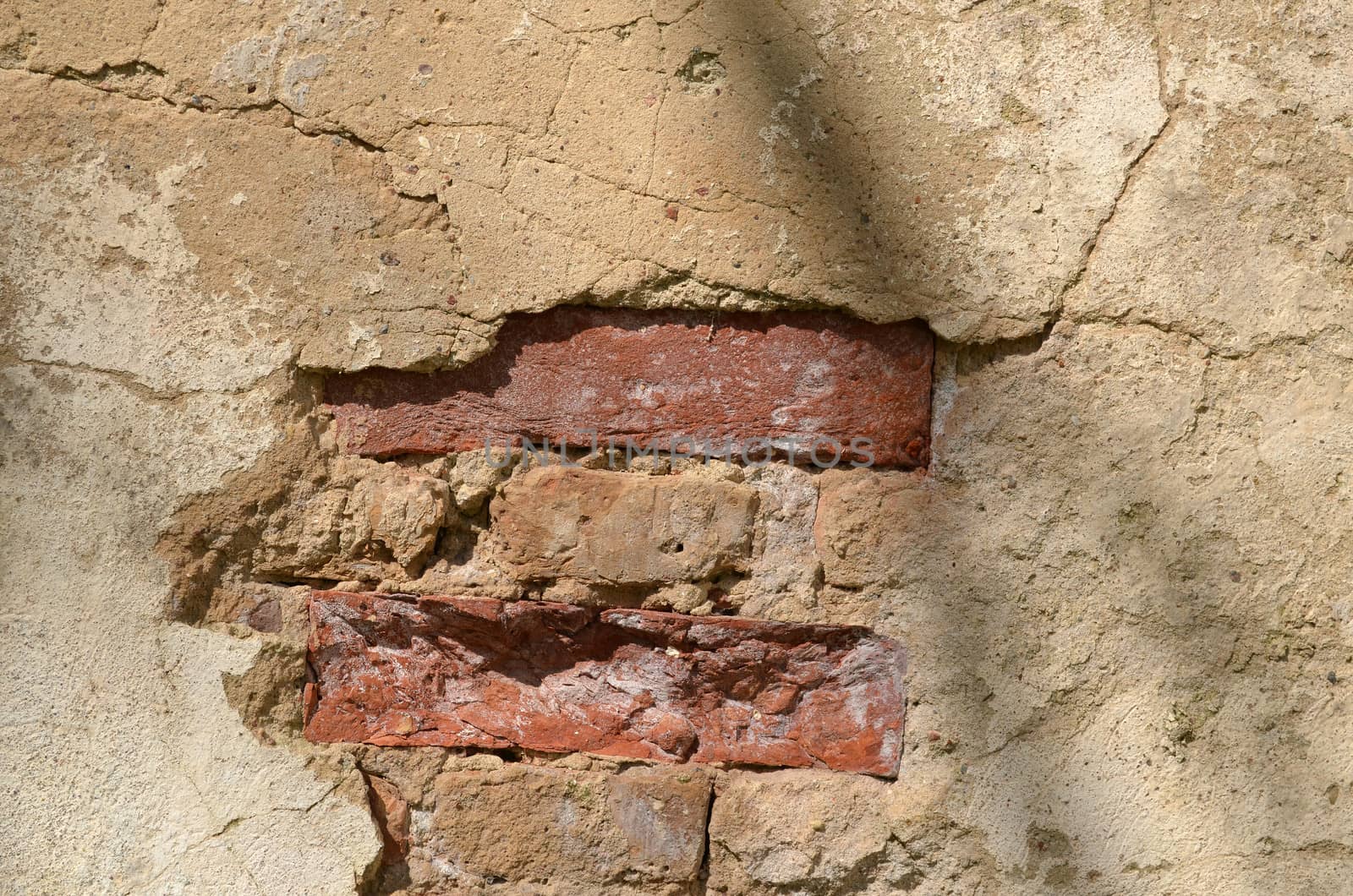 vintage damaged grunge brick wall requires repair background.