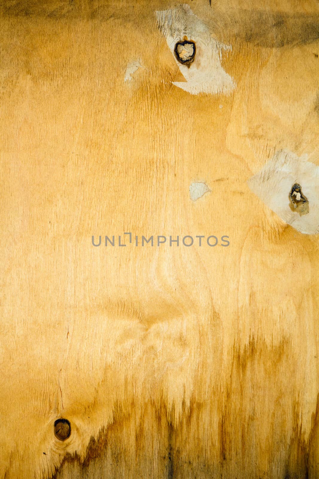 Yellow texture of the old sheet of plywood. The vertical position