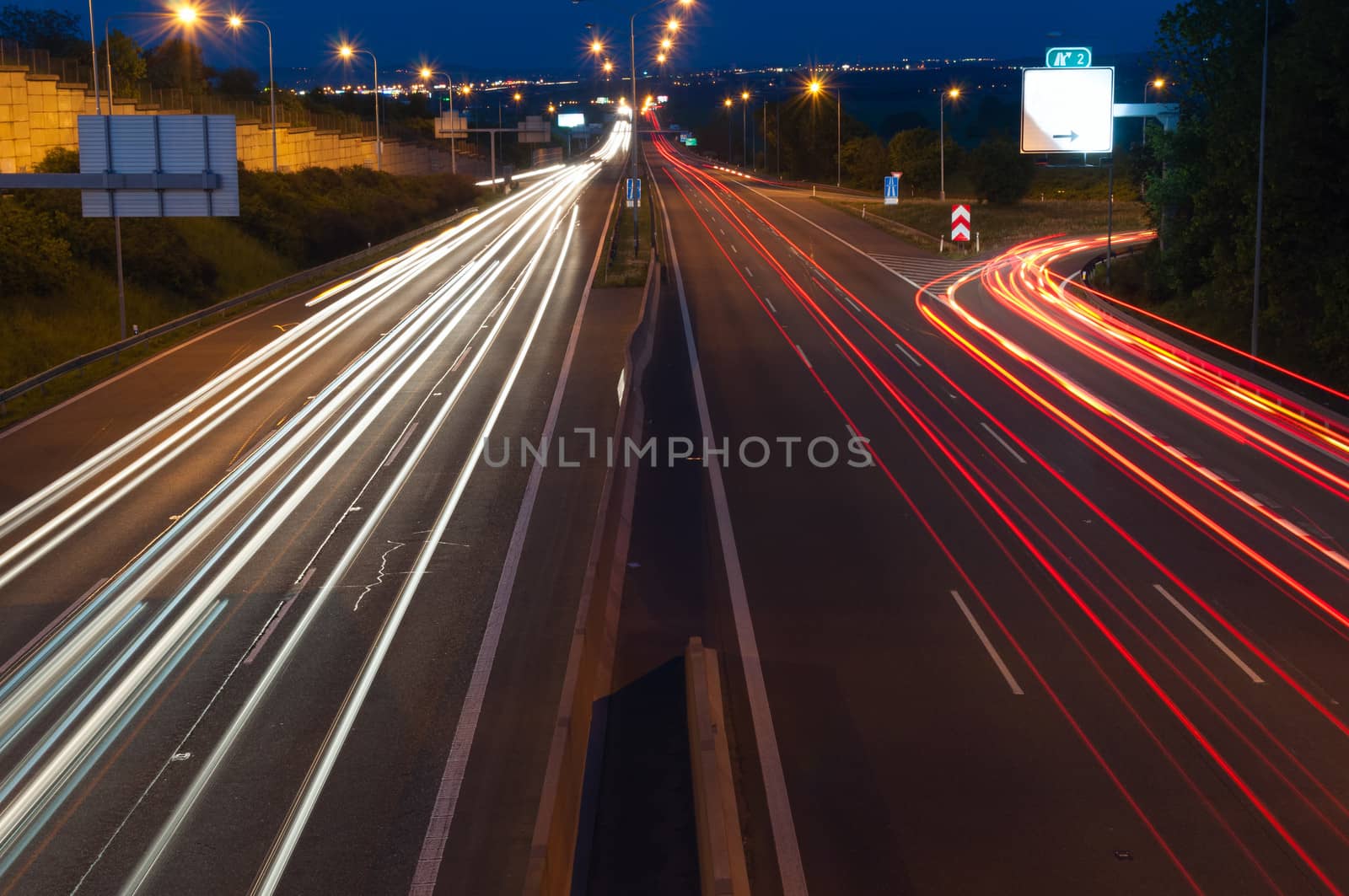 Traffic Lights - Cars in Motion on Night Highway