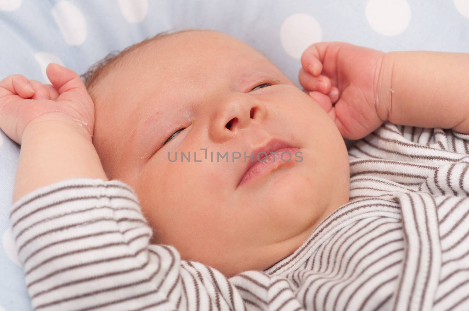 Closeup of Face of Lying Newborn Baby