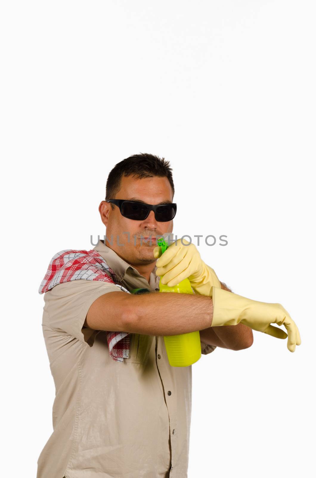 Latin man cleaning his house