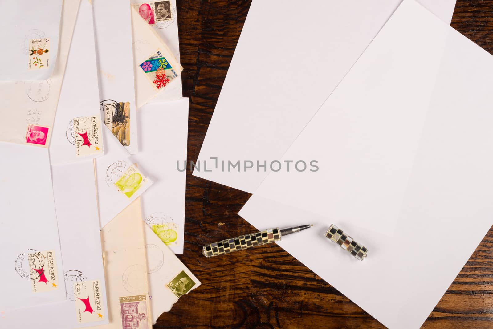 Envelopes, stamps and writing paper from the snail mail times