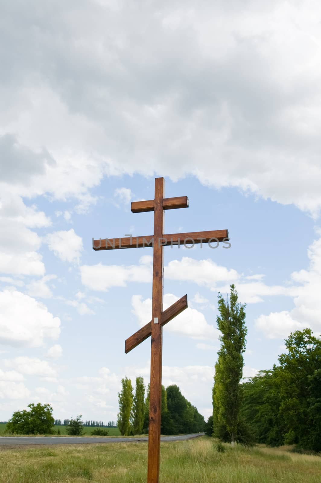 orthodox cross on near road by mycola