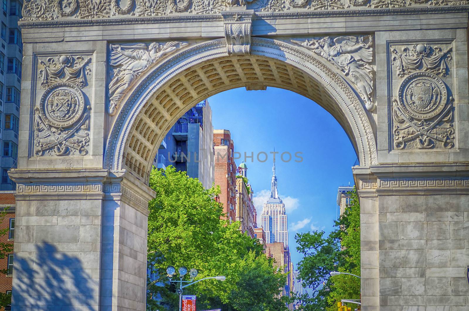 Washington Square Arch and the Empire State Building in the dist by marcorubino