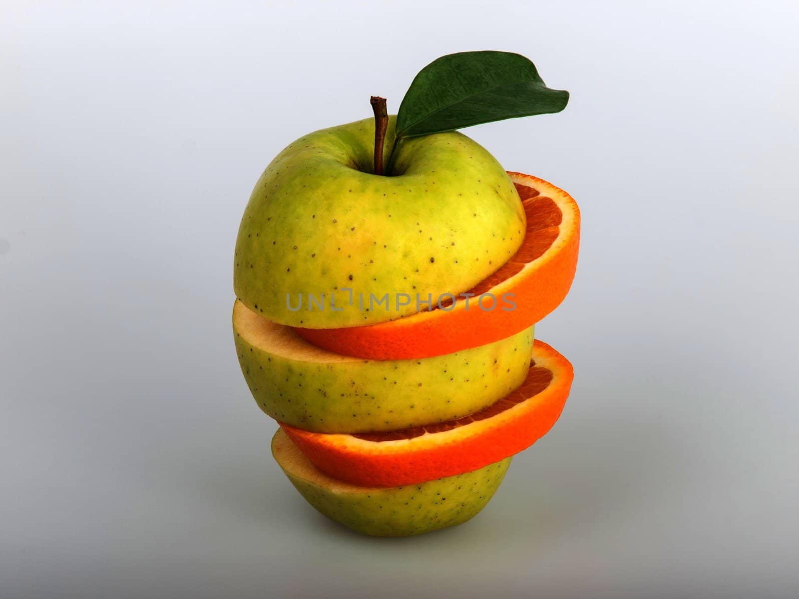 The combination of pieces of apples and oranges