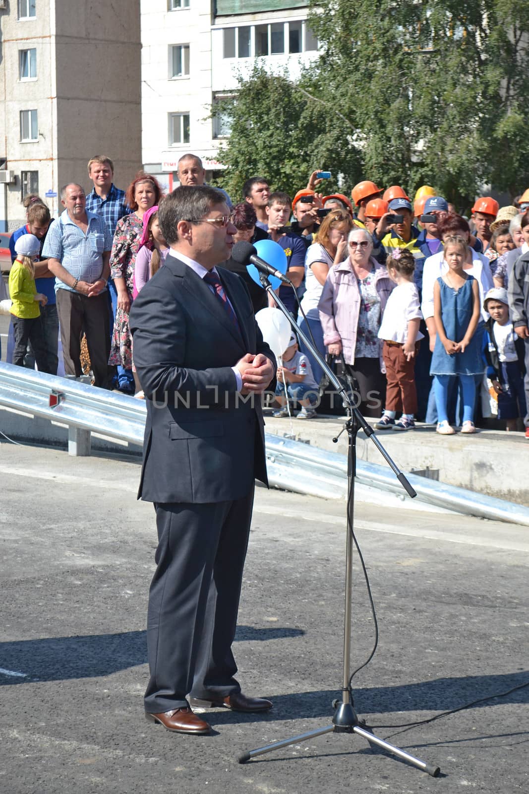 The governor of the Tyumen region Vladimir Yakushev at official opening of a new traffic intersection on Melnikayte St., Tyumen. 22.08.2013