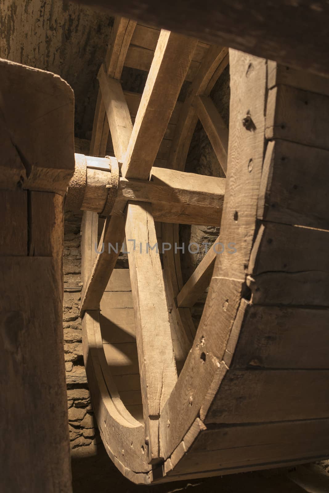 inside old wheel of a mill by compuinfoto