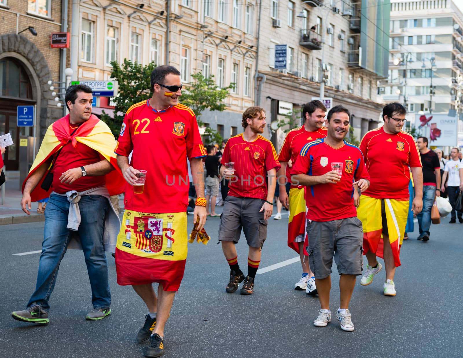 KIEV, UKRAINE - JUL 1: Spanish football fans go to EURO 2012 final match Spain vs. Italy on July 1, 2012 in Kiev, Ukraine