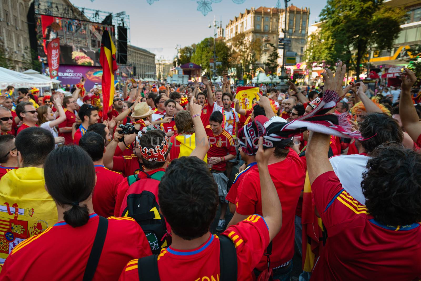 KIEV, UKRAINE - JUL 1: Spanish football fans prepare on the central fun zone for EURO 2012 final match Spain vs. Italy on July 1, 2012 in Kiev, Ukraine