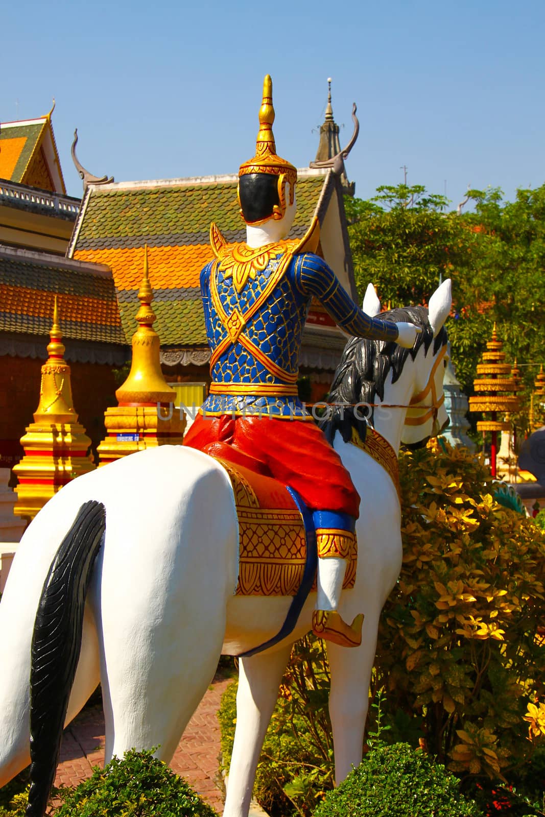 Statue of a noble horseman in the Wat Preah Prom Rath temple yard in Siam Reap, Cambodia