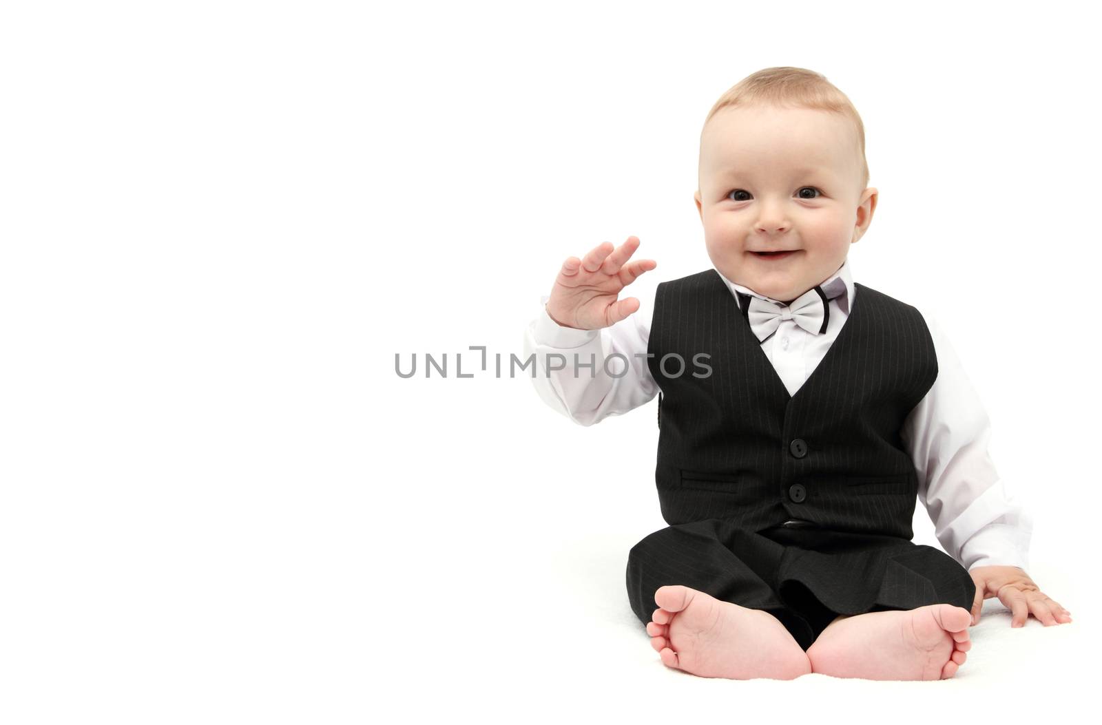 Happy baby boy in suit