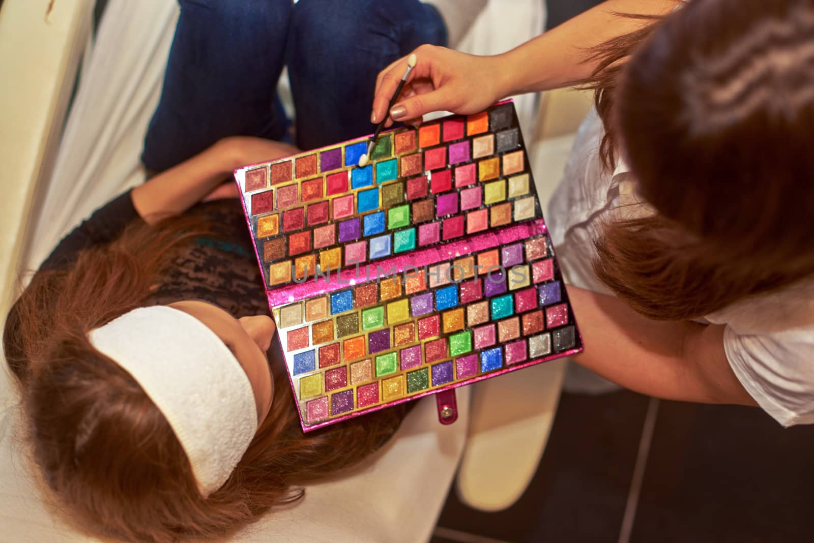 Large makeup palette used by an makeup artist closeup
