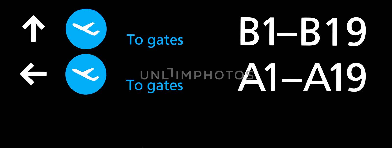 Black airport terminal sign with blue symbols by svedoliver