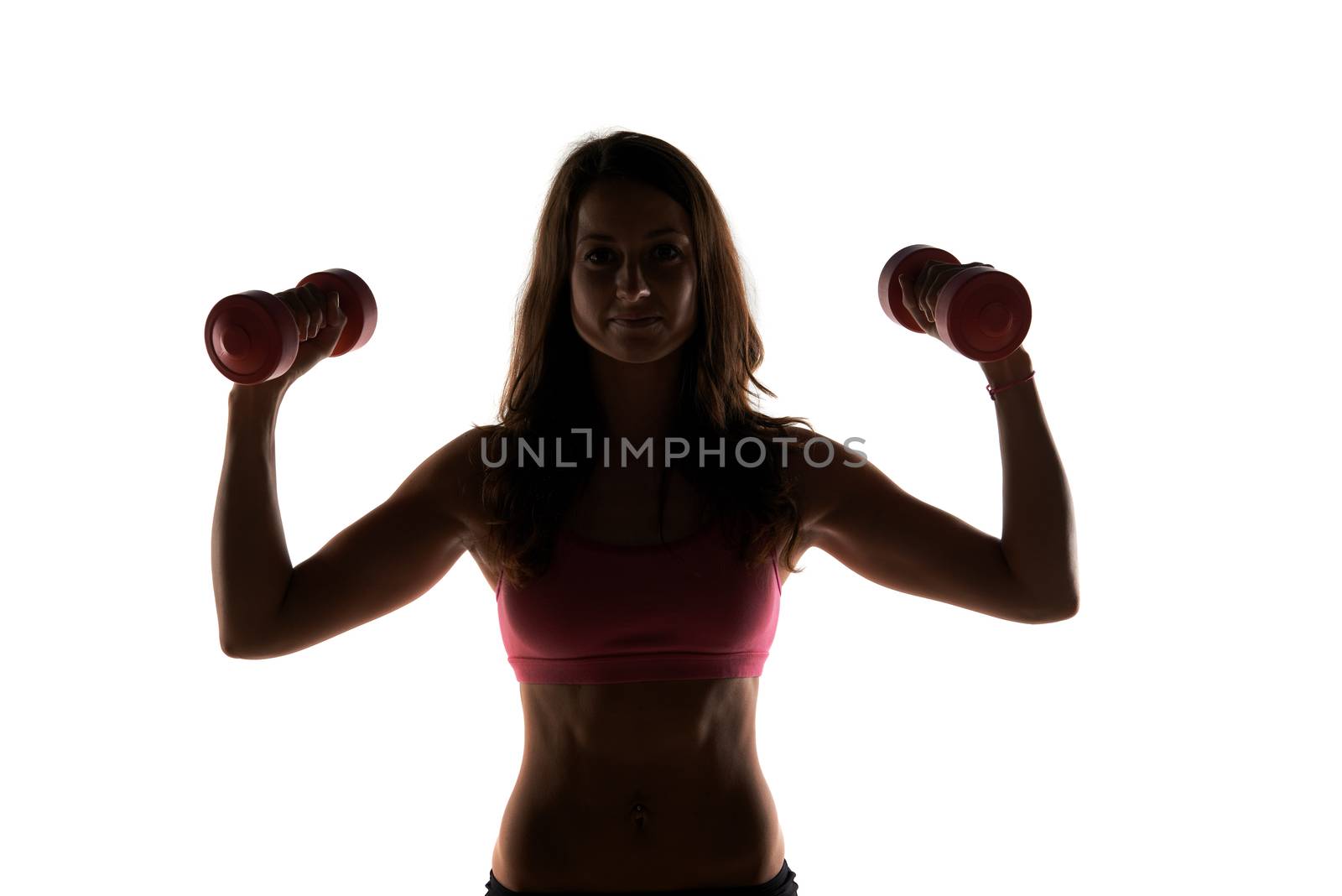 Silhouette Fitness instructor in a studio working out