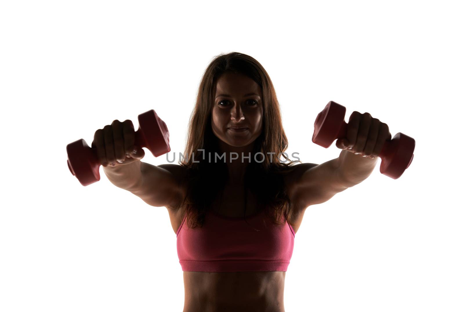 Silhouette Fitness instructor in a studio working out