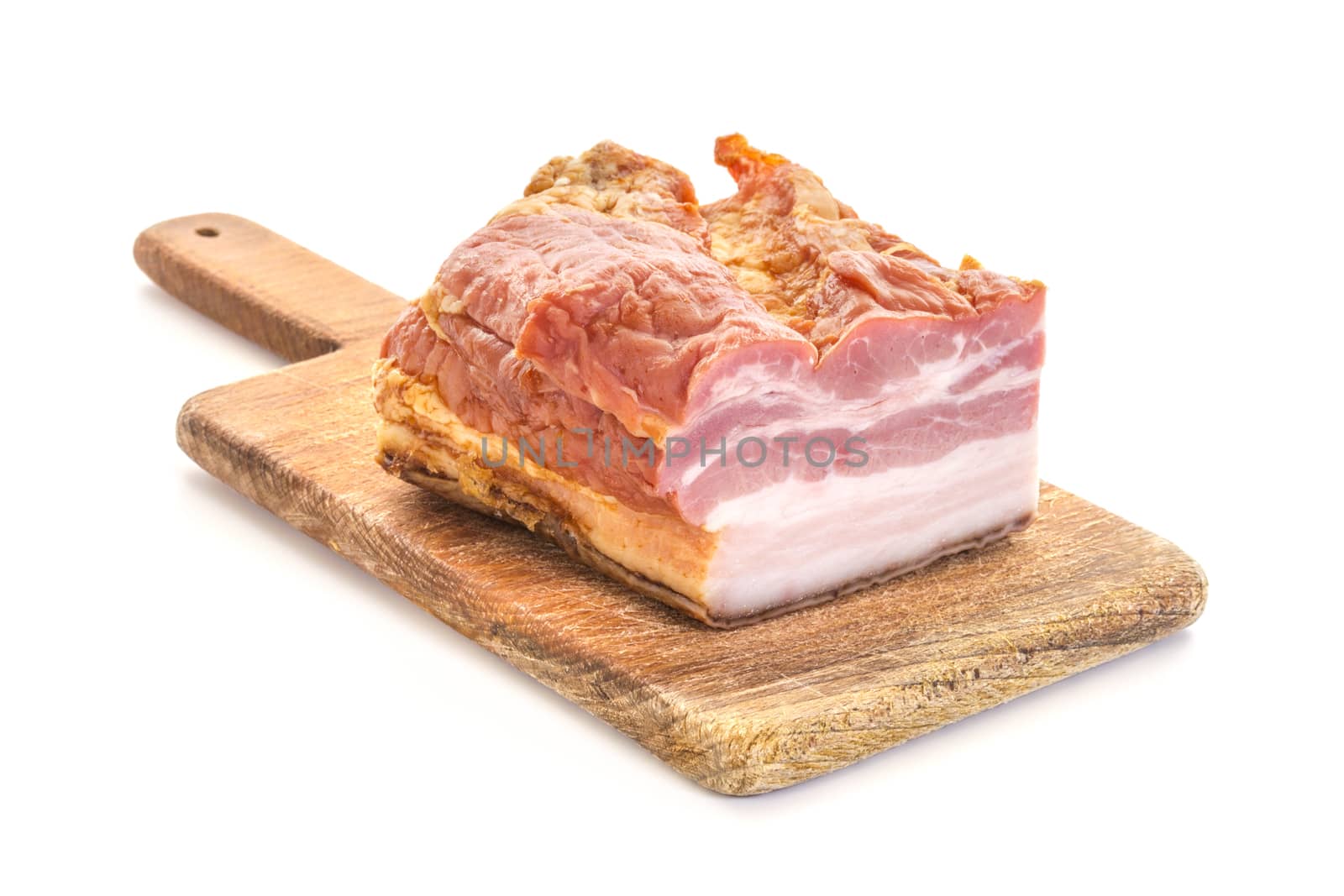 Smoked Bacon on Old Wooden Cutting Board, High Key, Horizontal shot