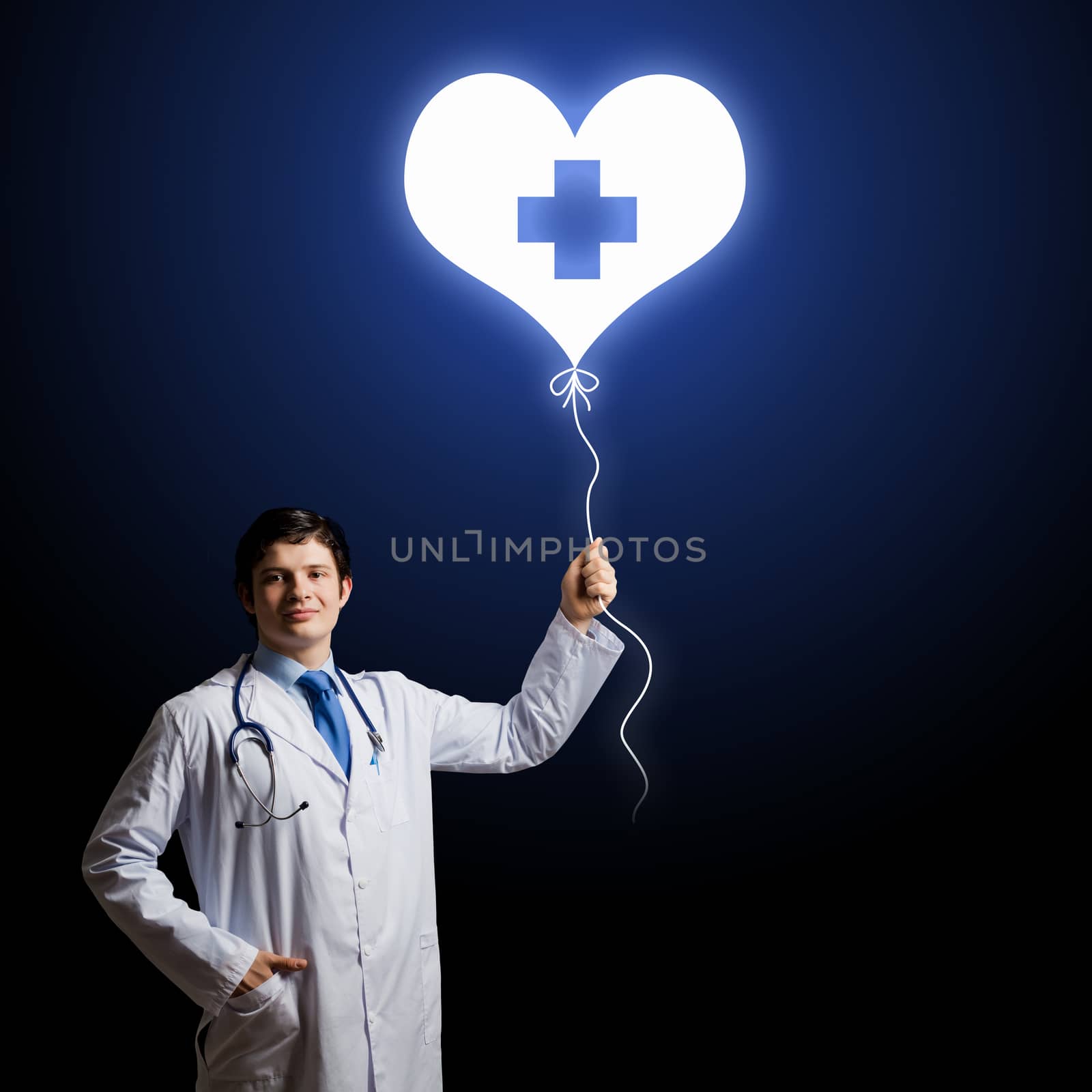 Young male doctor cardiologist with heart symbol