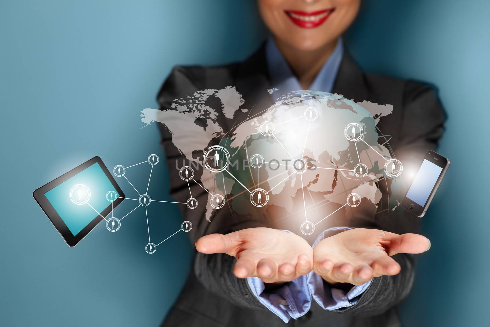 Close up image of businesswoman with 3d images of devices in her hands