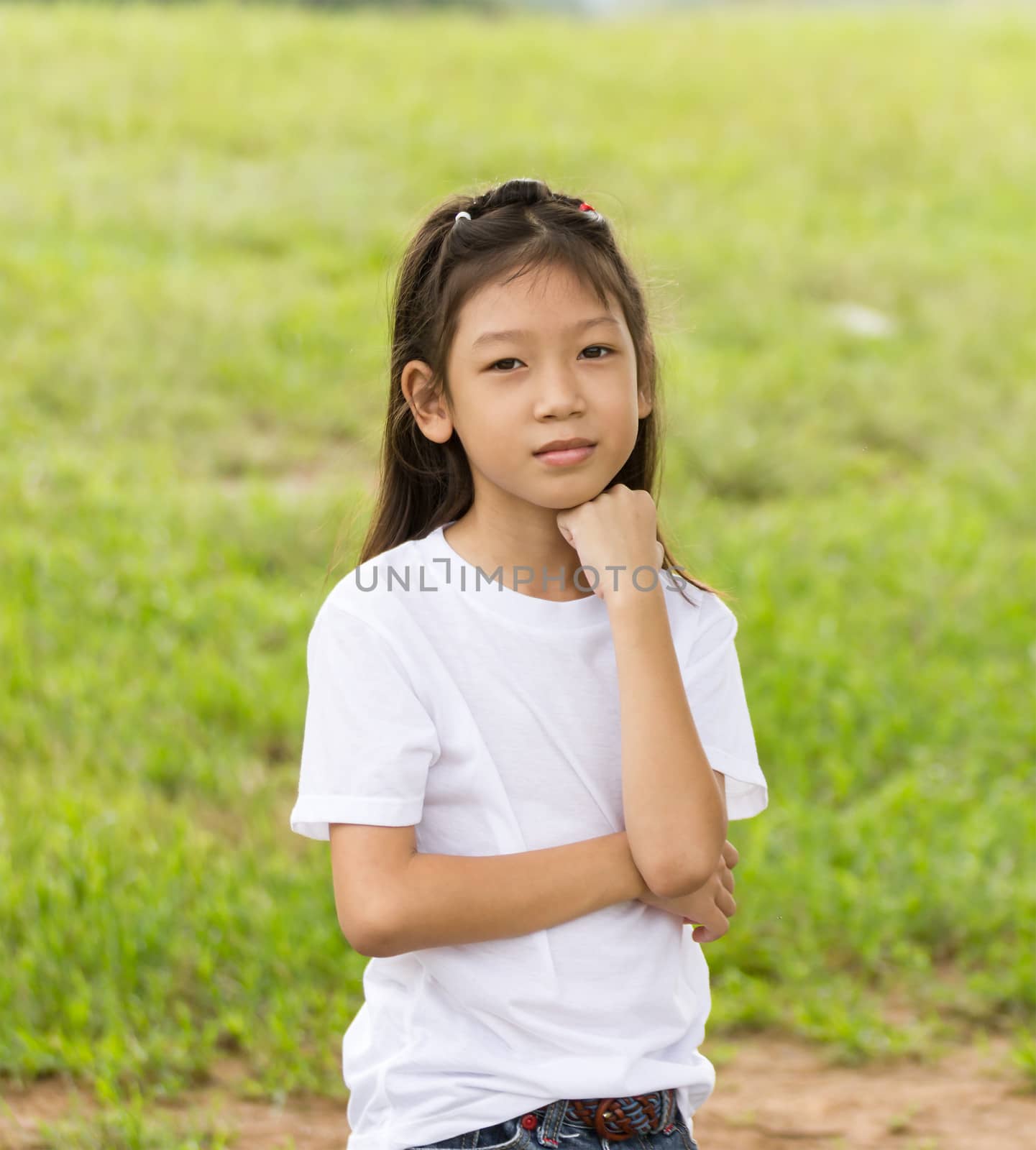 Outdoors portrait of beautiful Asian young girl