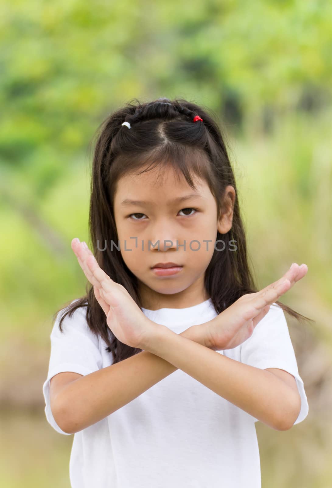 Outdoors portrait of beautiful Asian young girl