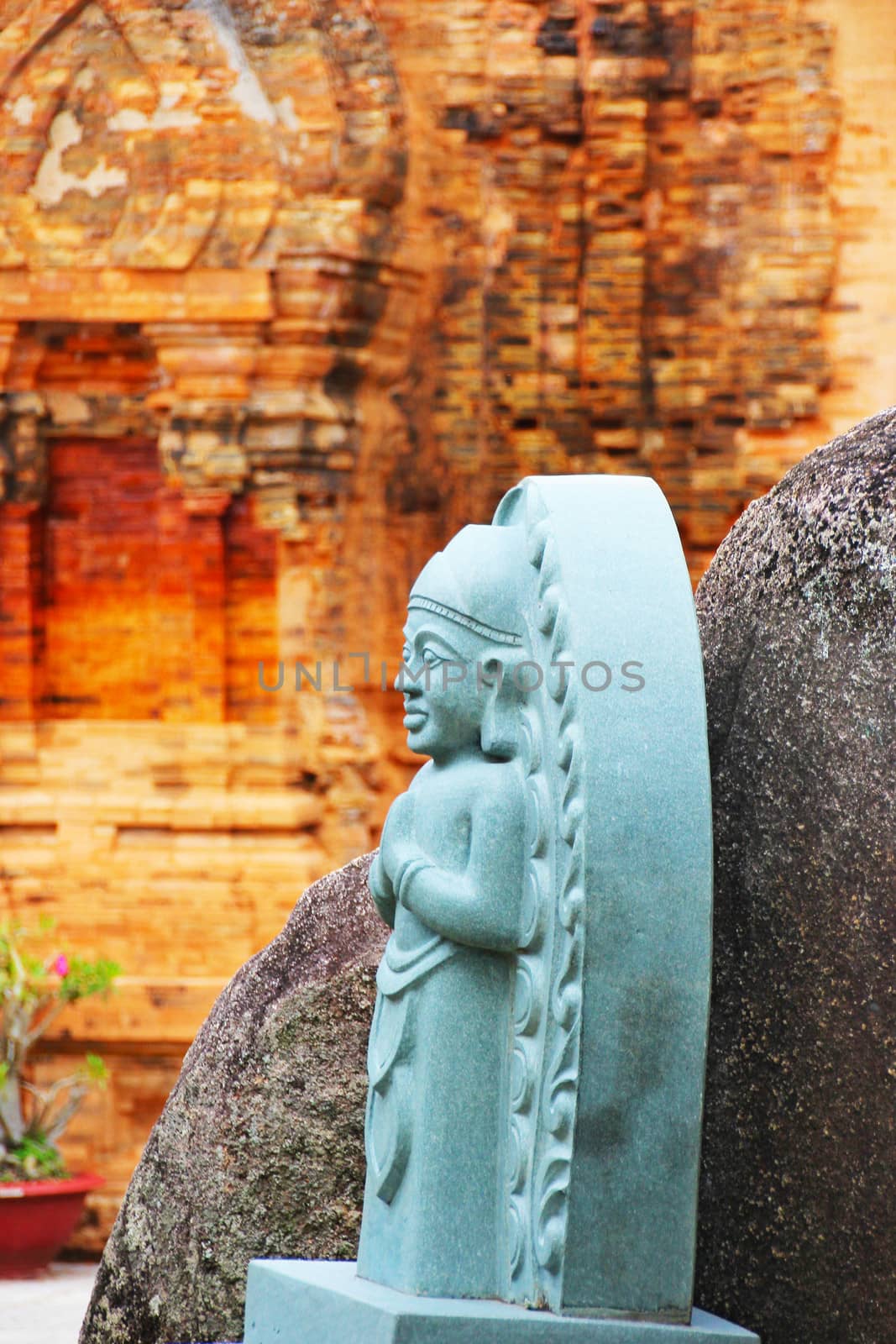 Statuette in Po Nagar Cham hindu temple in Vietnam by tboyajiev