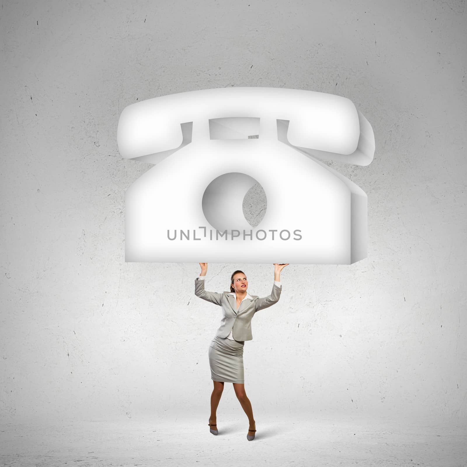 Image of businesswoman holding macro sign of telephone