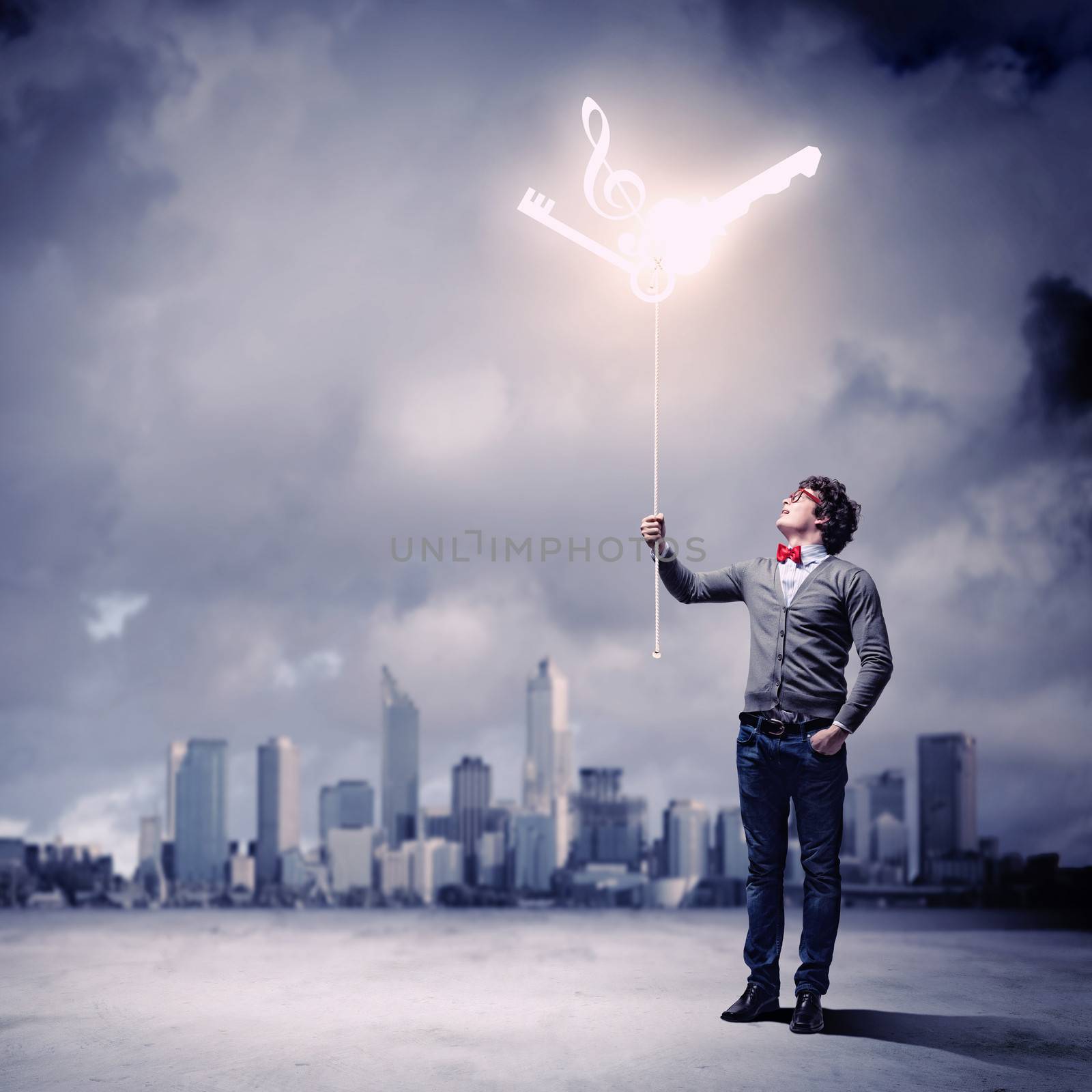 Young man with music notes against polluted and ruined landscape