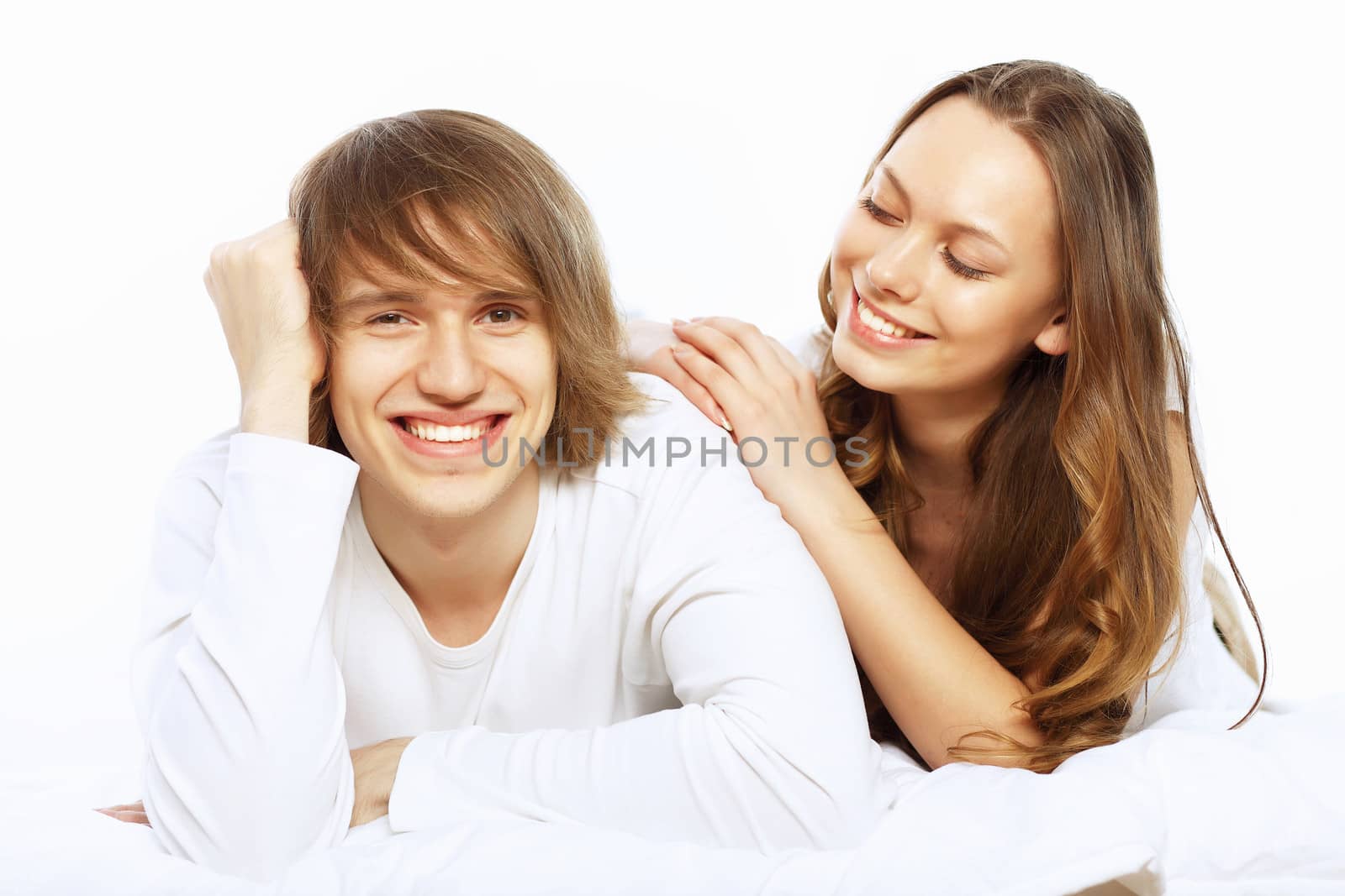 Portrait of young happy couple at home