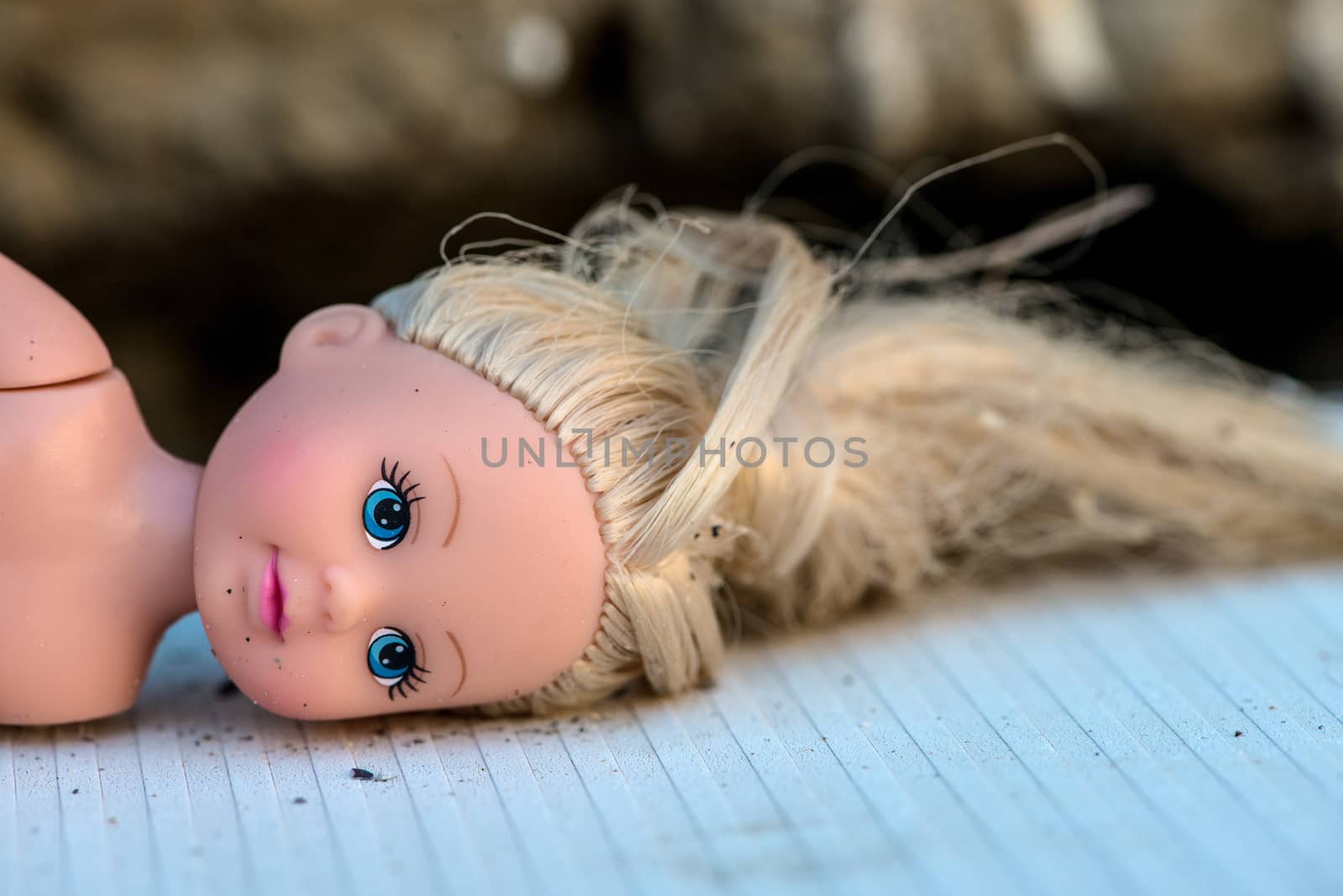 doll head with blond hair