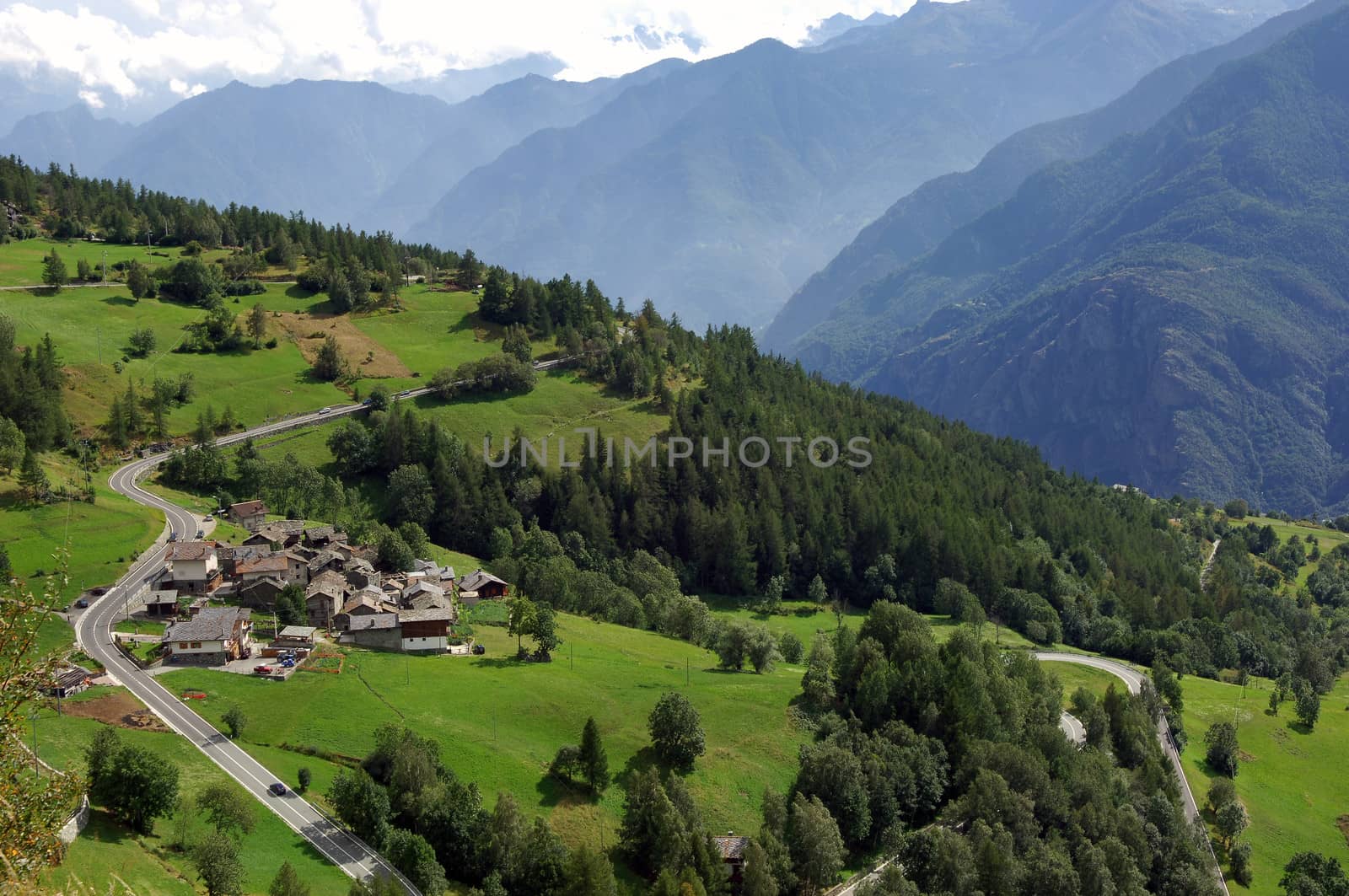 group of houses along a road in a slope of the Valle d'Aosta