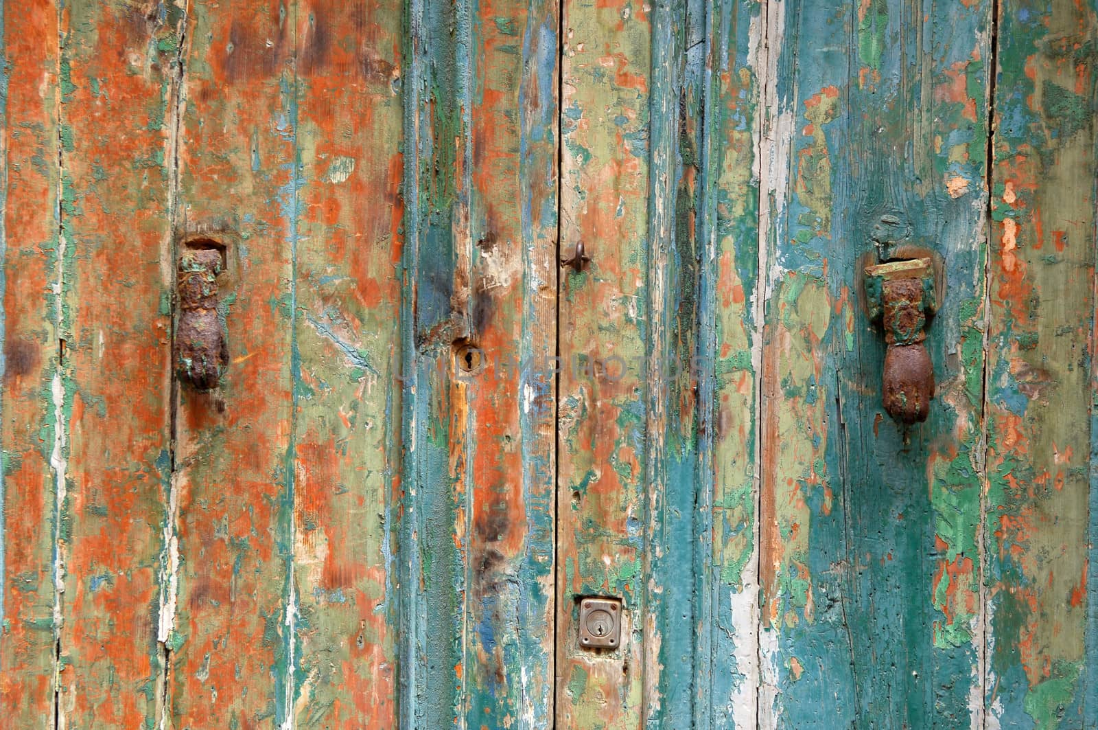 peeling door damaged from weather and the passage of time
