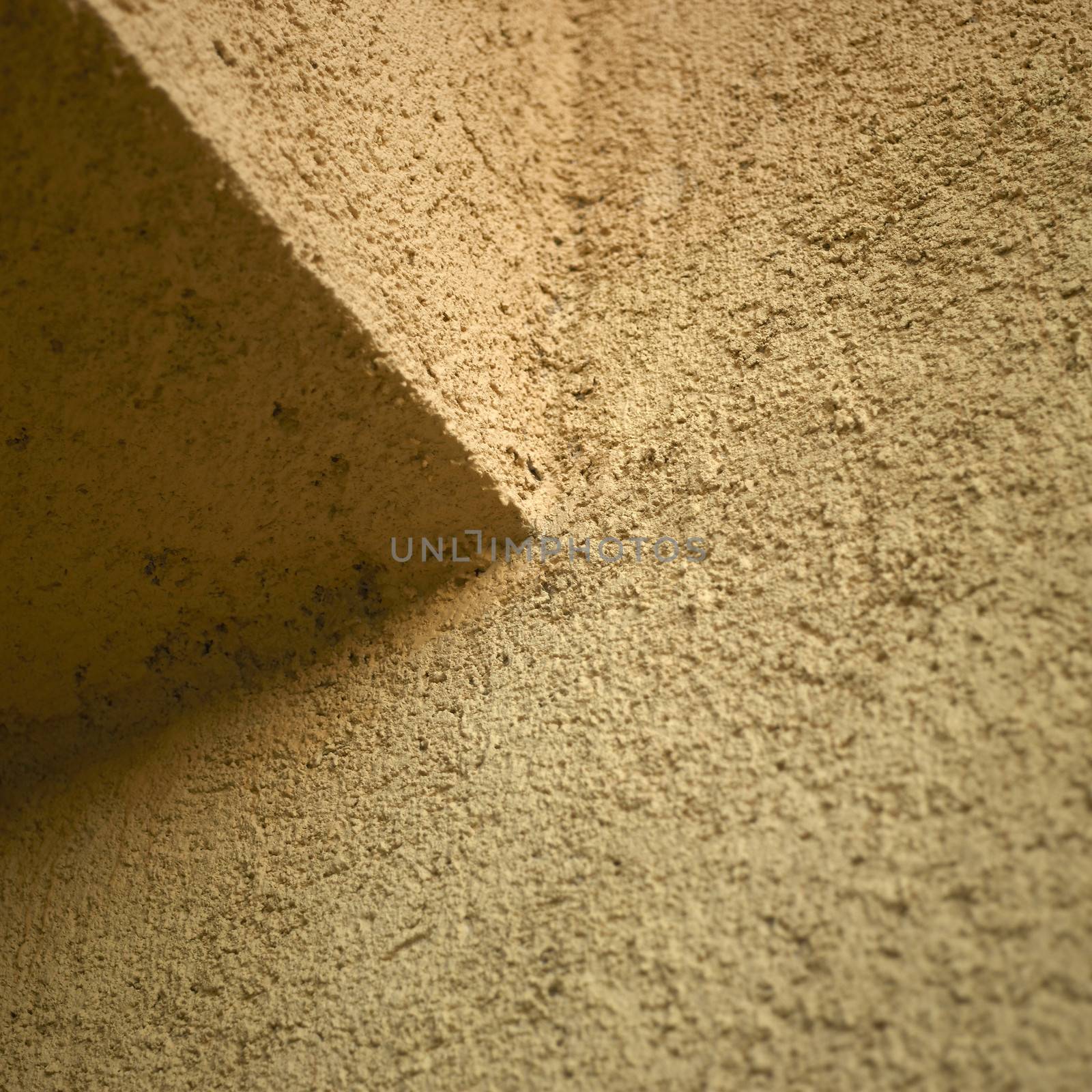 orange stucco wall close up