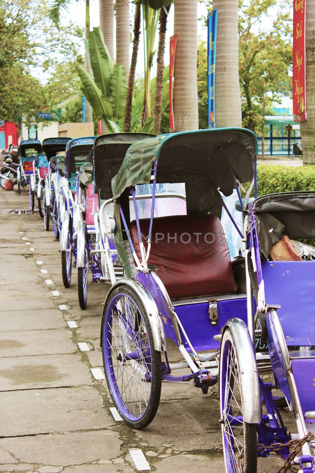 Traditional riskshaws in Hue, Vietnam. These are the most popular transport in the city