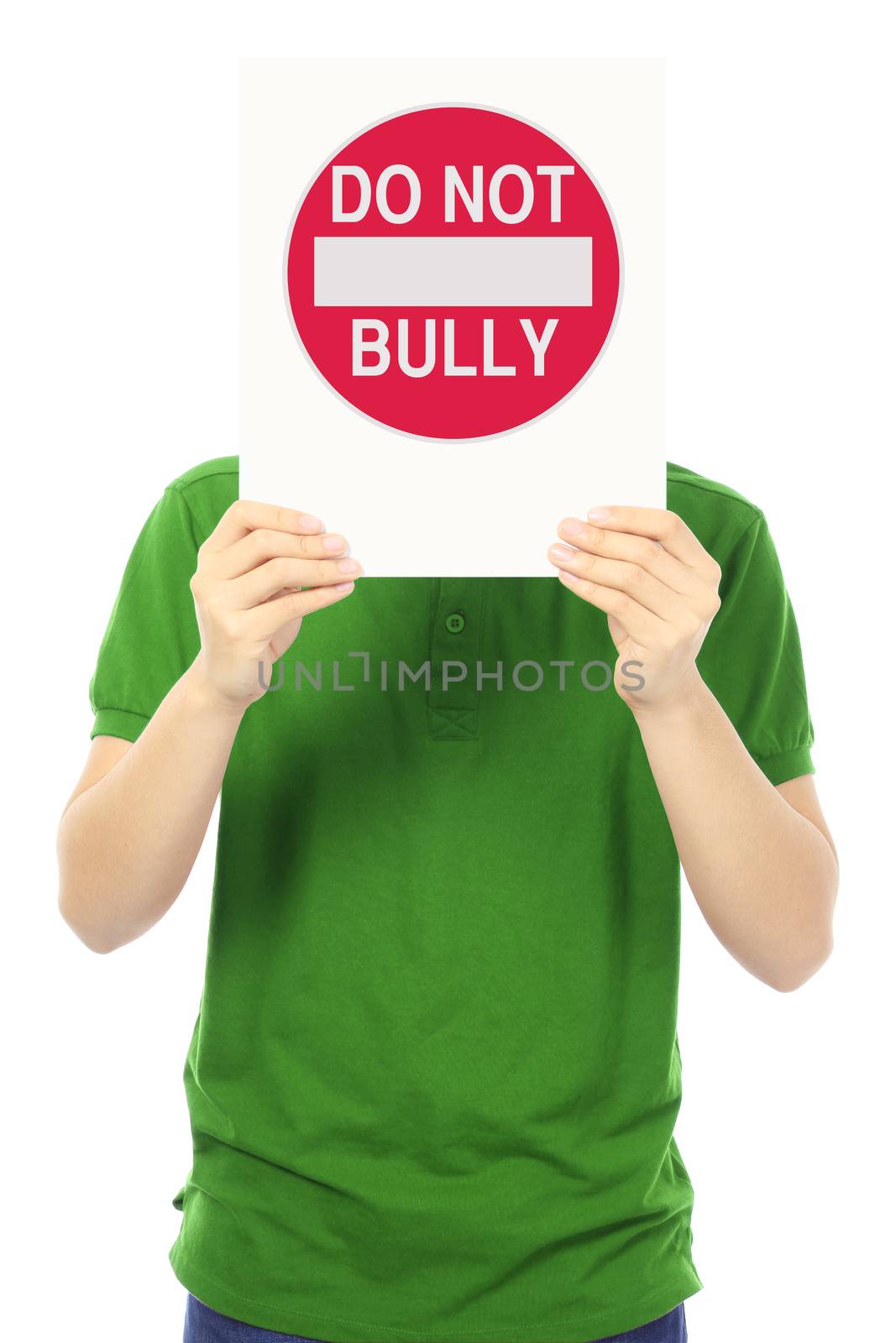 A teenager holding up a Do Not Bully sign