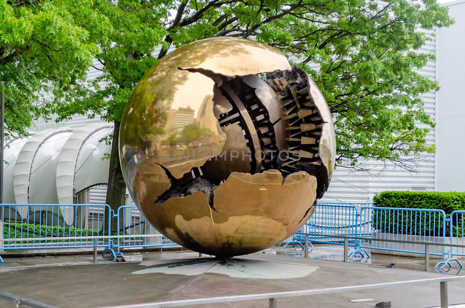 NEW YORK - MAY 28: One of the famous Sphere within Sphere bronze sculptures by A.Pomodoro outside United Nations Headquarters in New York, May 28, 2013. Other similar sculptures are in Vatican City and in Dublin