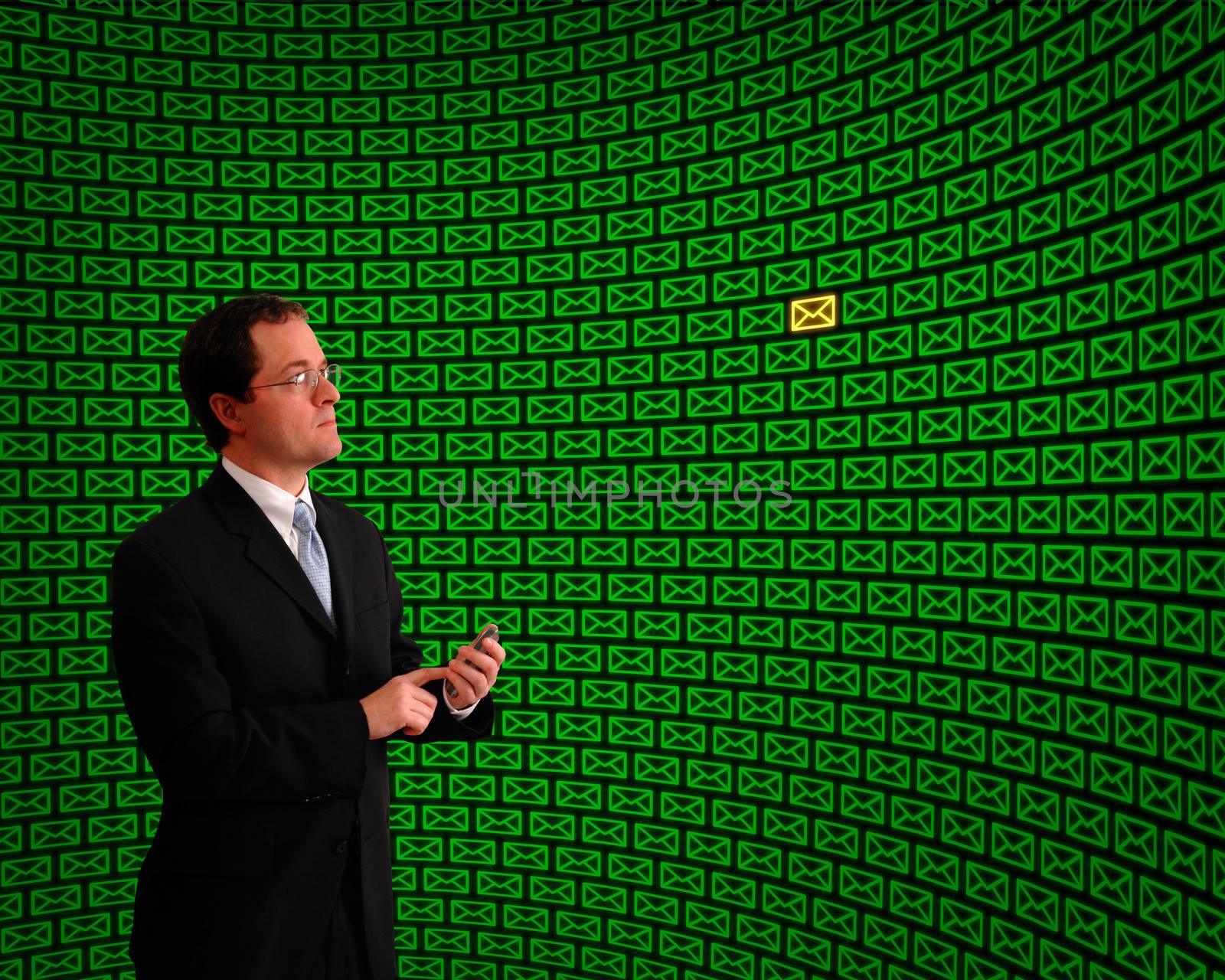 Man monitoring a field of green email message icons