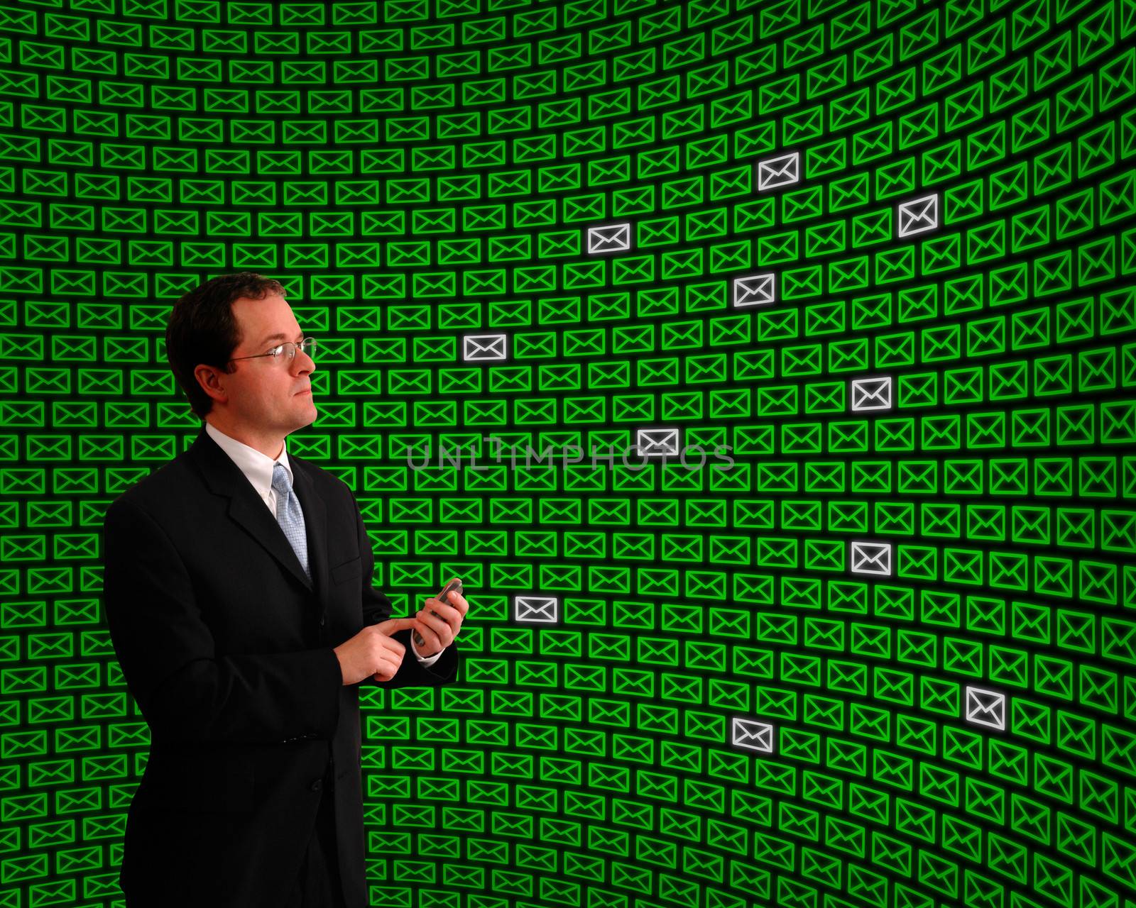 Man monitoring an array of emails among a field of green message icons