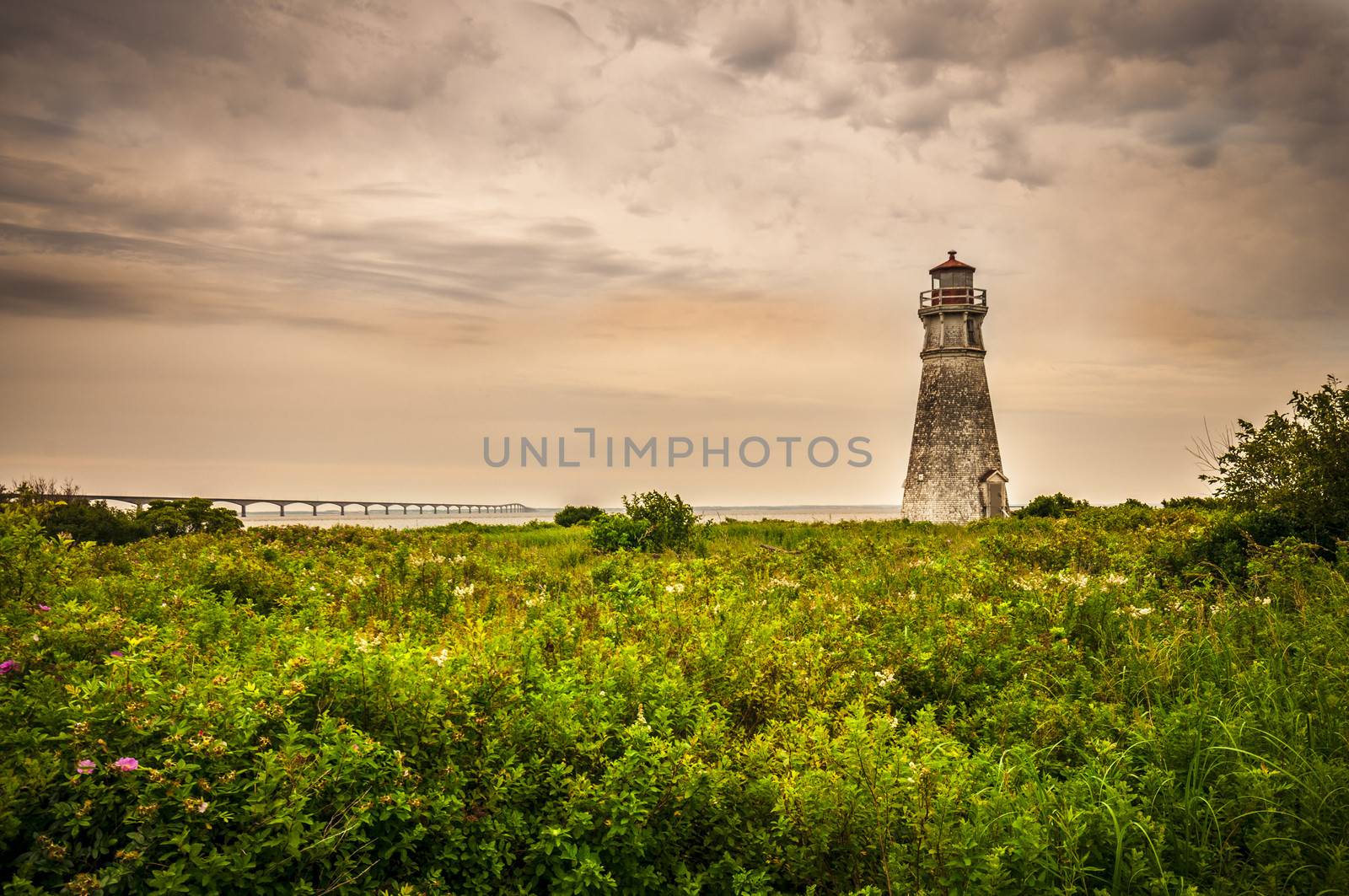 Cape Jourimain Lighthouse located in New Brunswick Canada hdr with dramatic sky
