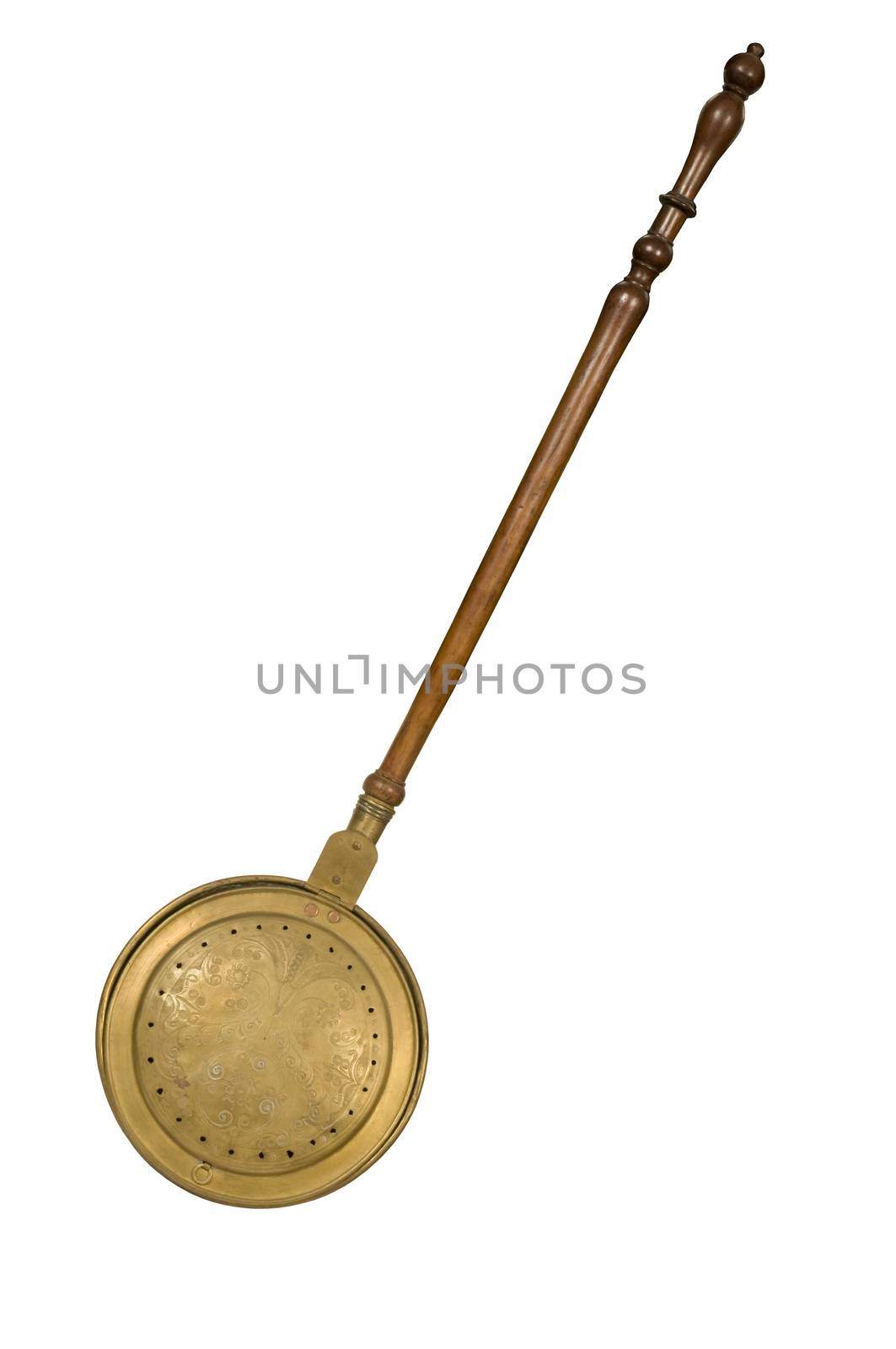 Long-handled antique bed warmer isolated against white background