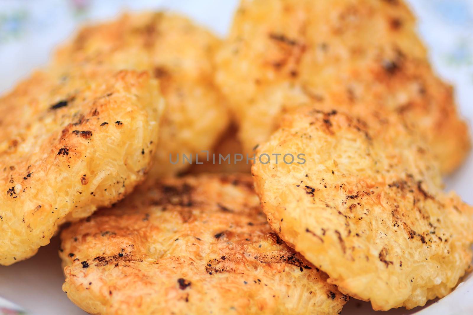 whole rice made into balls and baked