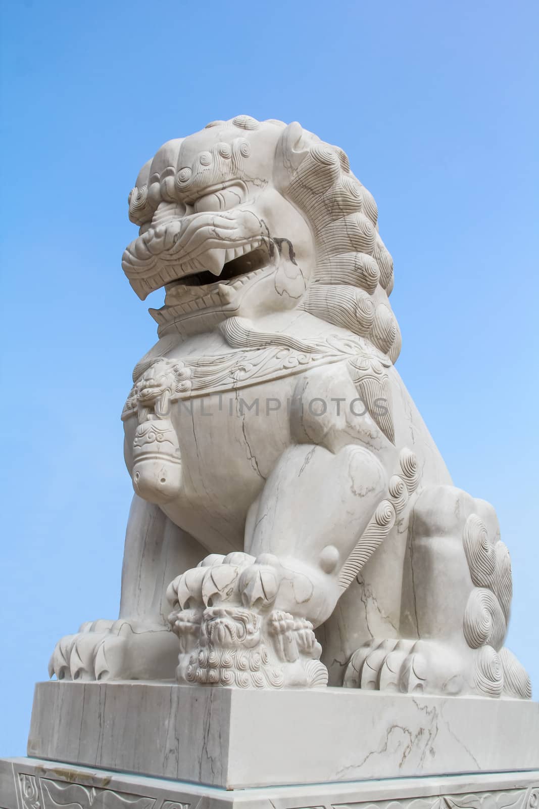 Lion statue in stone at a temple in Udonthanee, Thailand