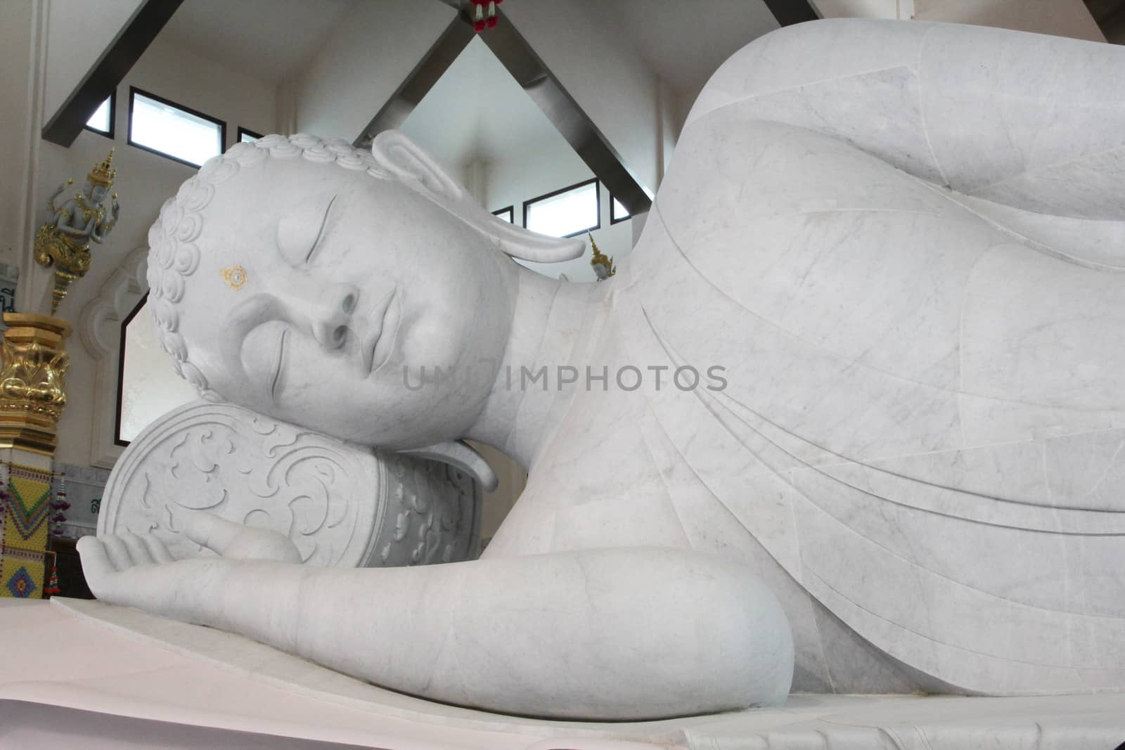 white statue of buddha in Udonthanee of Thailand.