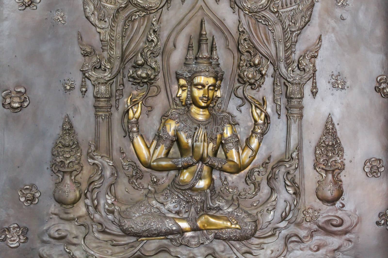 art on metal plate about buddha history at temple in Udonthanee  province, Thailand