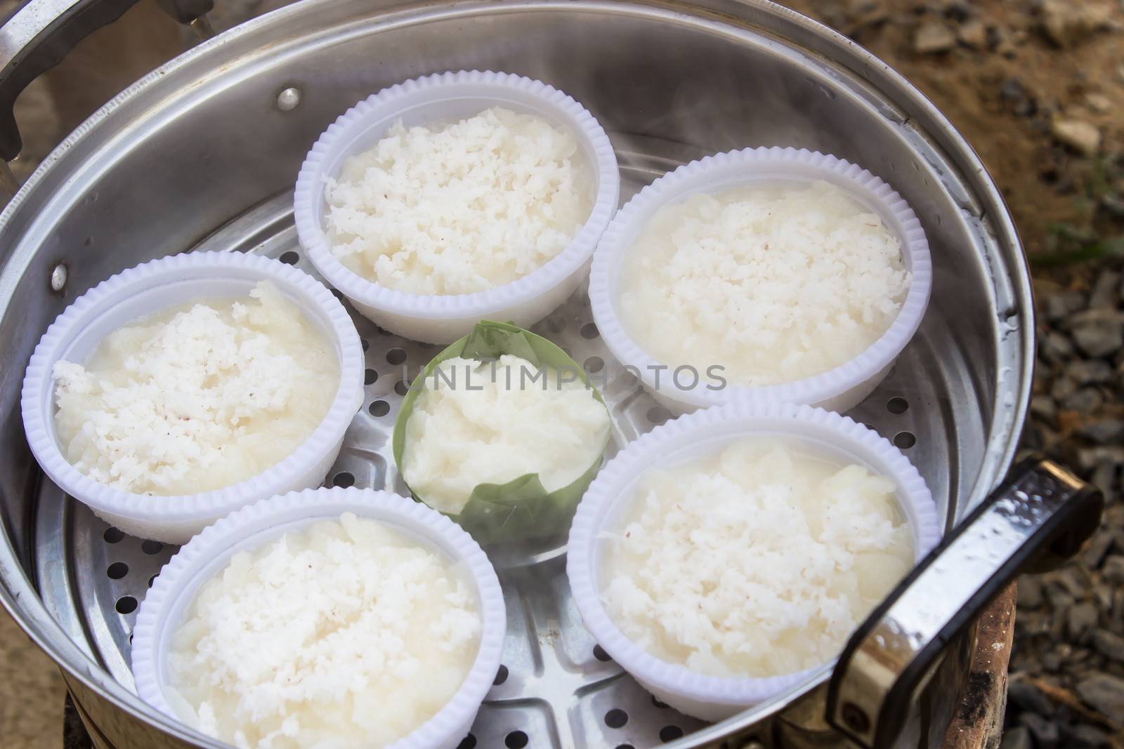 Traditional Thai dessert, made from Wax gourd or Chalkumra, sugar, and coconut milk, wrap with banana leaf.