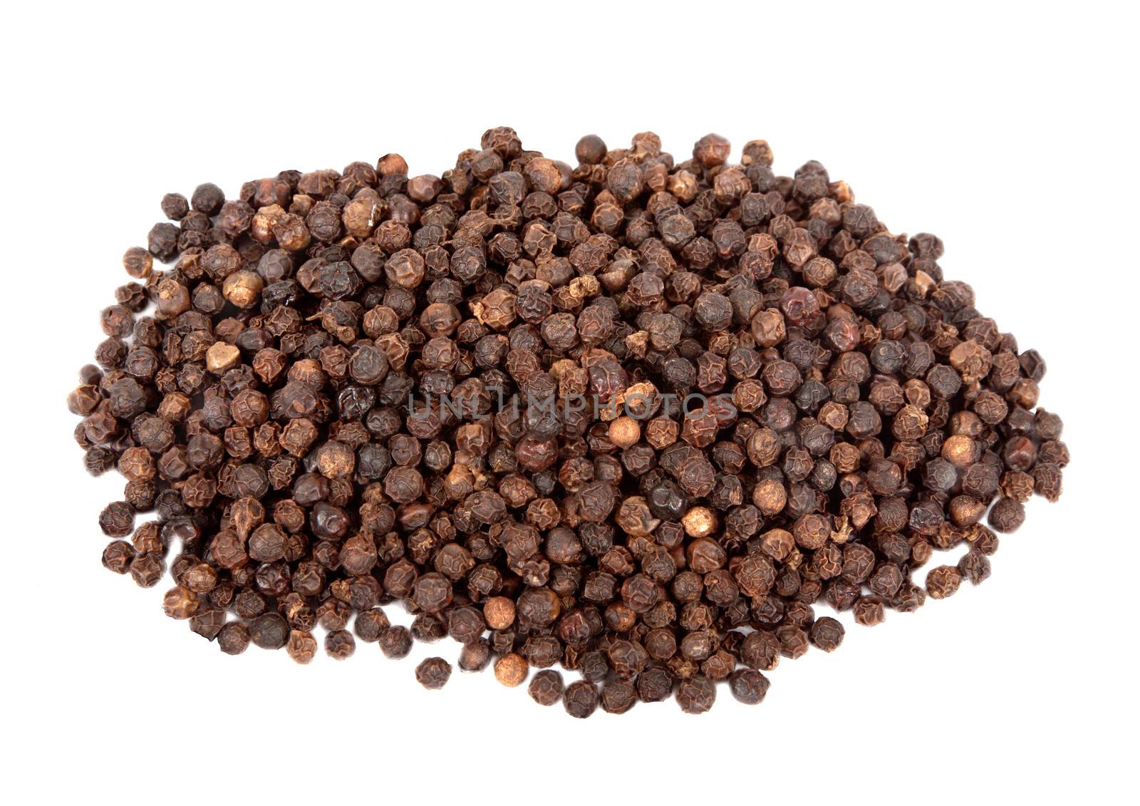 pile of black whole pepper isolated on white background