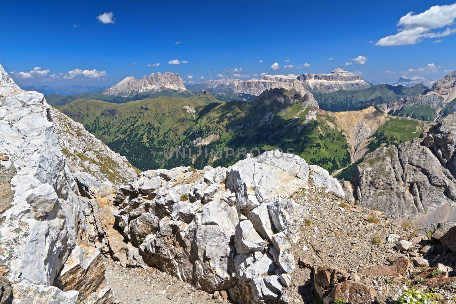 summer view of Dolomites with San Nicolo' valley, Sassolungo and Sella mount, Trentino, Italy