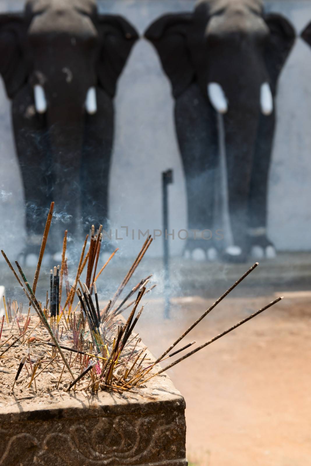 Incense sticks in a Buddhist temple  by iryna_rasko