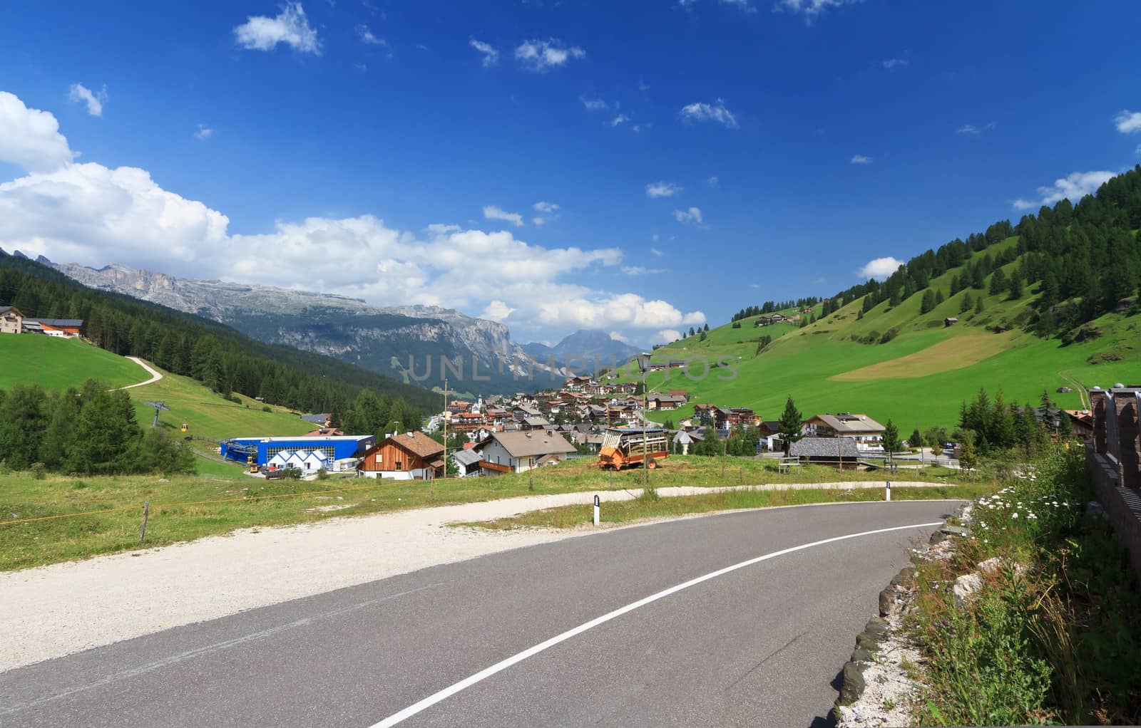 summer view of Val Badia with San Cassiano small village, Italy