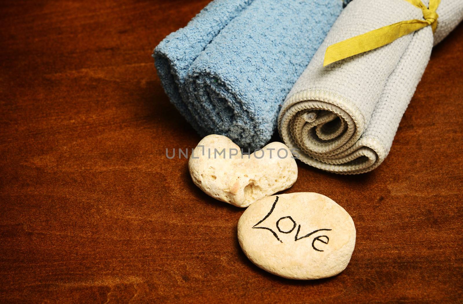 love and spa products or wash cloths for wellness concept