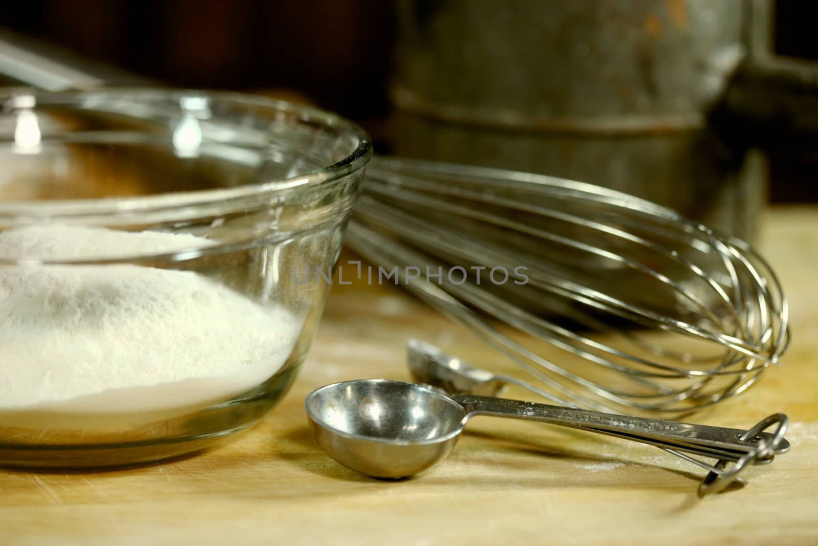 Bread Baking Ingredients on a Wooden Background by tobkatrina